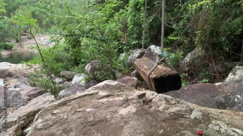 shot of a swing by the stream