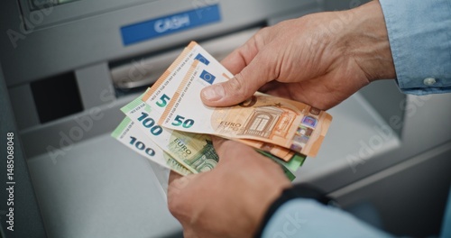 Cuadro en lienzo Close Up of Unrecognizable Man, Businessman Counting Euro Bills in Hands After Withdrawing Cash Money Transaction from ATM Machine
