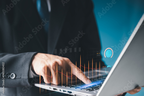 businessman staring at a computer screen displaying a featuring stock tickers or graphs. Stock trading platform concept. professional financial advisor.