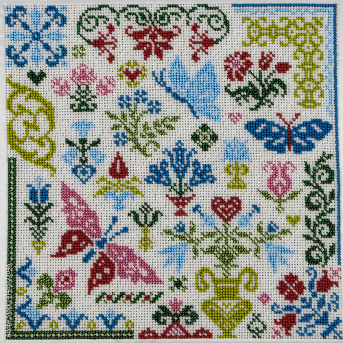 Obraz na płótnie Colorful Bead Embroidery Sampler with Butterflies and Floral Ornaments, Cross St