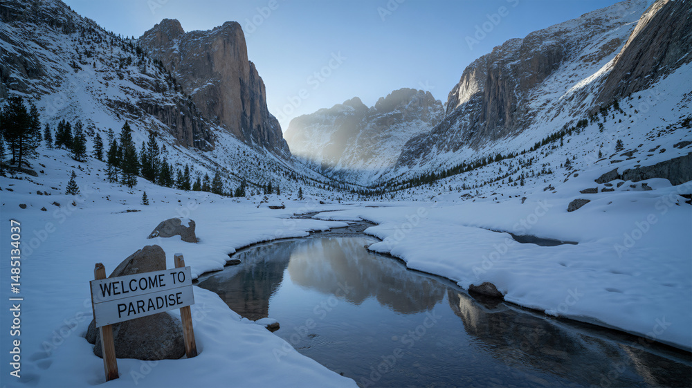 Snowy mountain valley with a crystal-clear stream