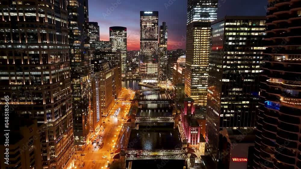 Sunset Chicago Skyline At Chicago In Illinois United States. Illuminated Downtown. Sunset City Landscape. Chicago At Illinois United States. Chicago City District. City Skyline Scene. Sunset Chicago Skyline At Chicago In Illinois United States. Illuminated Downtown. Sunset City Landscape. Chicago At Illinois United States. Chicago City District. City Skyline Scene.