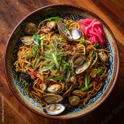 Seafood yakisoba on a traditional Japanese plate, showcasing perfectly cooked noodles tossed with a medley of seafood and fresh vegetables, drizzled with savory sauce