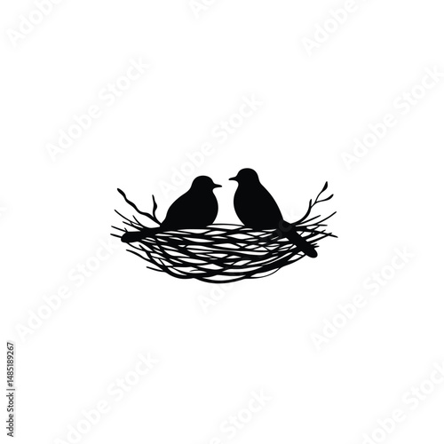 A nest with two birds silhouette on white background