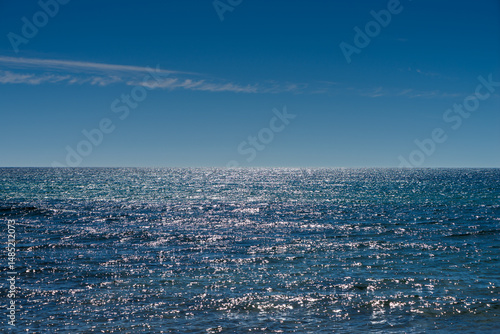 Sea and the sky on the beach Spiaggia Flumendosa near the town of Pula, Sardinia, Italy