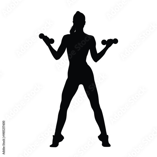 Silhouette of a woman exercising with a dumbbell