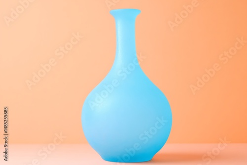Minimalist light blue vase on peach