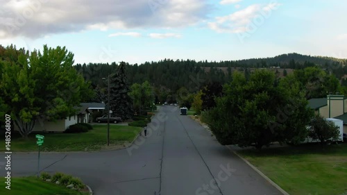 Wallpaper Mural Aerial Upward Scenic View Of Houses Amidst Green Trees In Residential Town By Hills - Post Falls, Idaho Torontodigital.ca