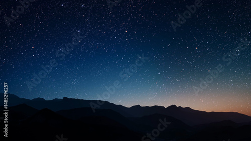 a a movement of stars in the night sky with the view of mountains.