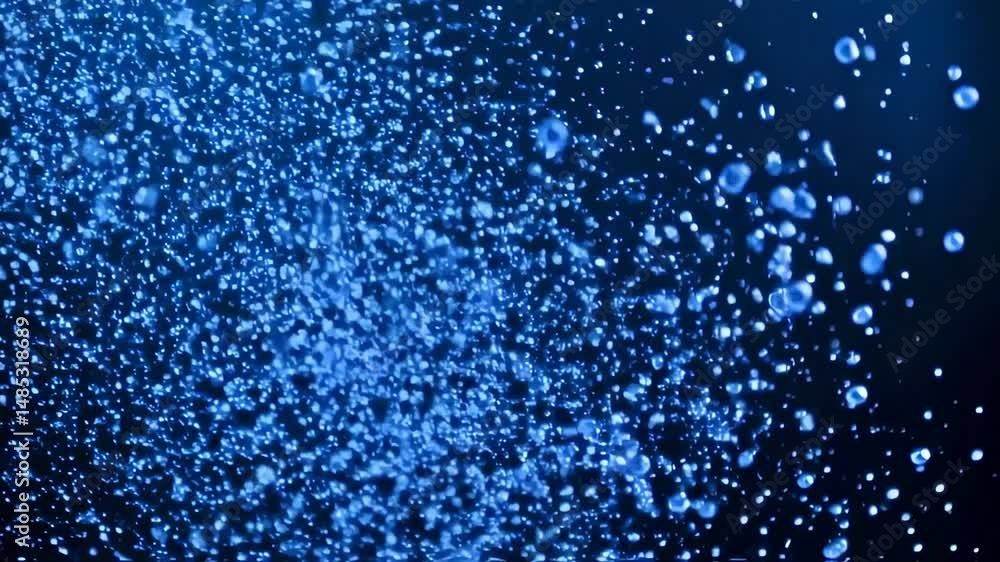 Droplets Floating in Slow Motion Blue Abstract Background Droplets Floating in Slow Motion Blue Abstract Background