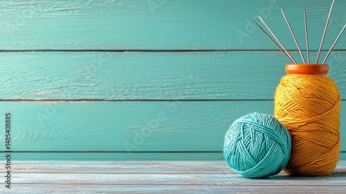 Yellow and Teal Textured Decorative Balls and Vase on Teal Wood Background
