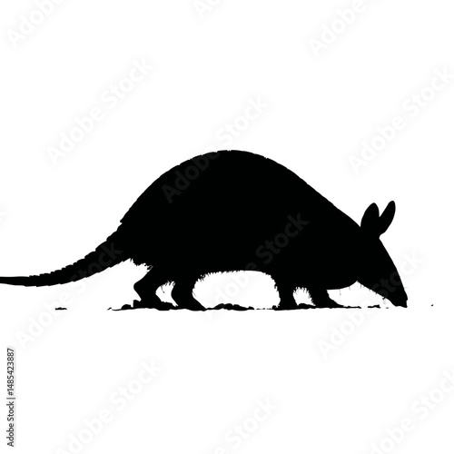 Solid black silhouette of an armadillo digging