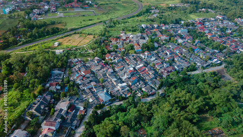 aerial view of Dense Village Housing Amidst Natural Landscape