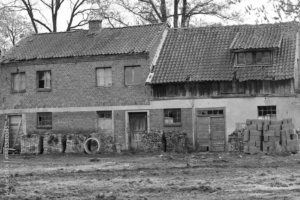Obraz premium devastated old historical buildings, black and white photo, Braniewo, Poland