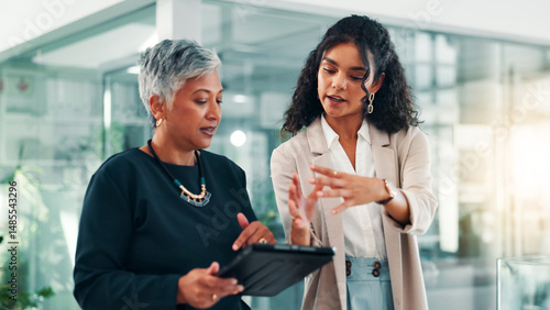 Feedback, tablet and business women in office for project, planning and collaboration. Professional, teamwork and meeting for mentor advice with digital tech for online report, research and website