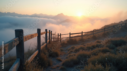 Mountain Vista with Wooden Fence Above Clouds at Sunrise