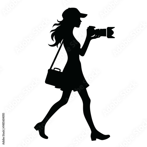 Silhouette of photographer walking with camera against white background