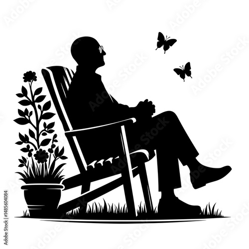 Elderly Man Relaxing in Chair in Garden Silhouette