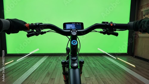 Front view of an electric bicycle handlebar with digital display on green background, highlighting eco transport, modern technology and mobility concepts