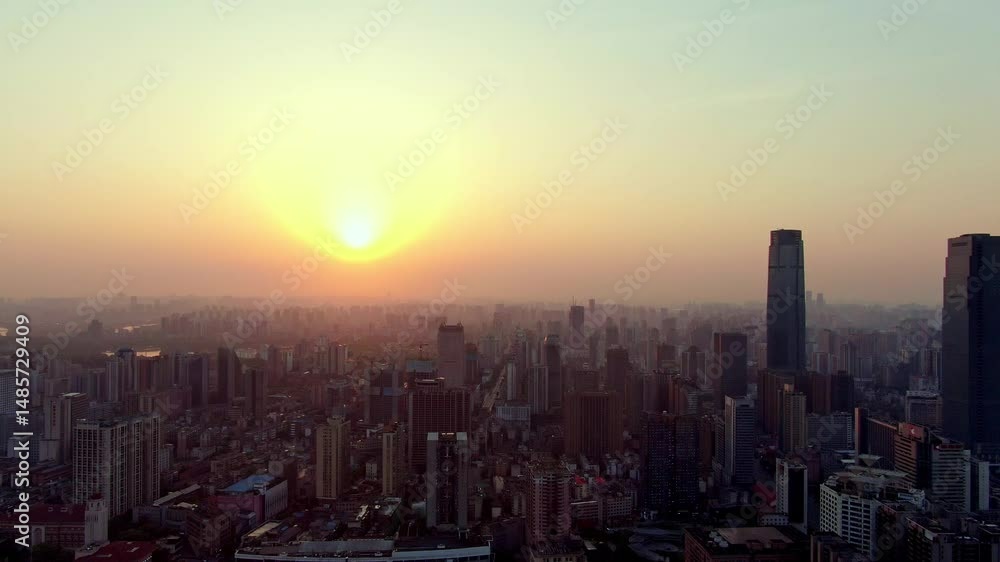 Vibrant sunrise over city skyline reveals morning bustle and beauty Vibrant sunrise over city skyline reveals morning bustle and beauty