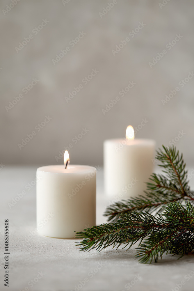 cozy christmas scene featuring aromatic candles and fresh pine branches on clean white background cozy christmas scene featuring aromatic candles and fresh pine branches on clean white background