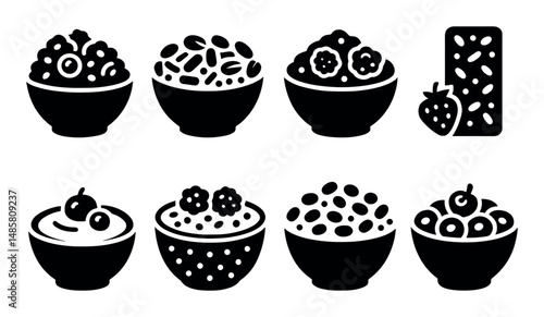 Variety of cereal and yogurt bowls with berries and granola bar