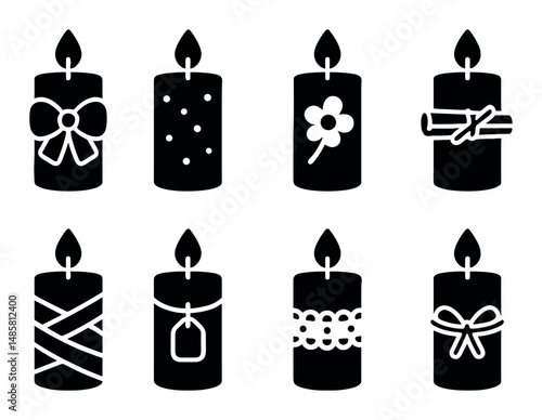 Set of eight decorative candles in simple black and white design