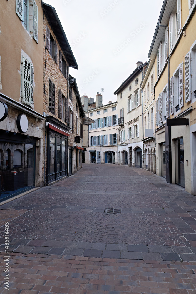 Bourg en Bresse with typical shopping street with shops and cafes in France Bourg en Bresse with typical shopping street with shops and cafes in France