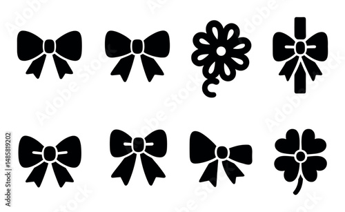 Set of eight black silhouette bow designs on white background