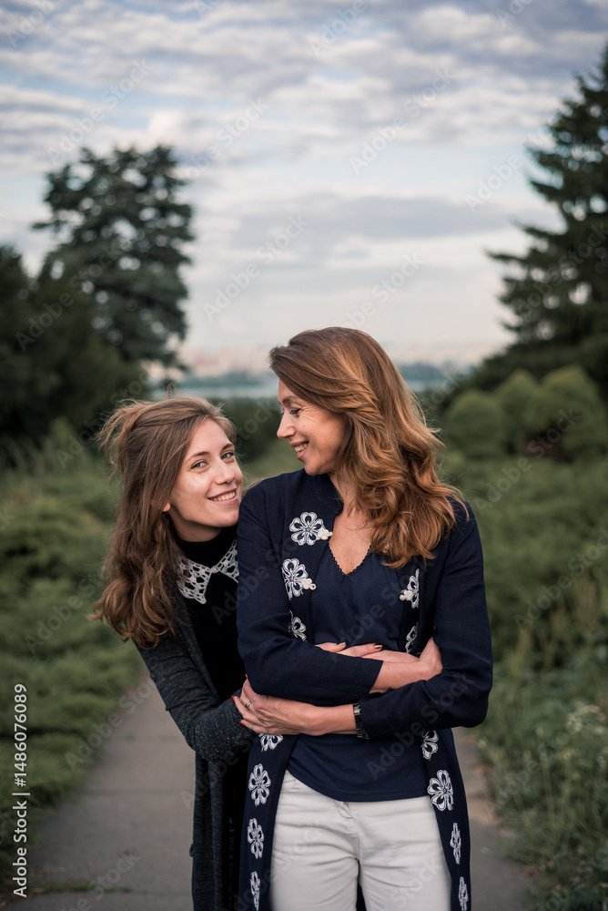 Fototapeta premium Daughter and mother hugging each other