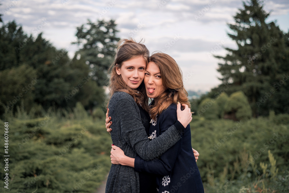 Fototapeta premium Daughter and mother hugging each other
