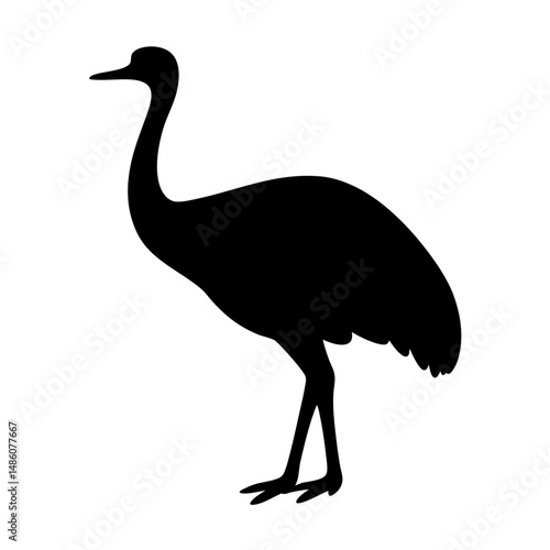 Elegant silhouette of a wading bird, perhaps a crane, standing majestically