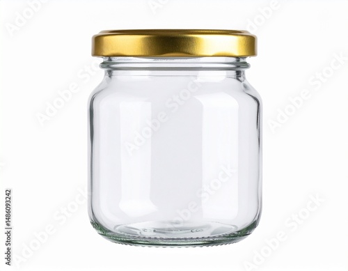 Empty short wide clear glass jar with glossy gold metal twist-off lid, isolated
