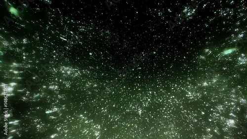 Glimmering cosmic journey through vibrant green starry vortex in space