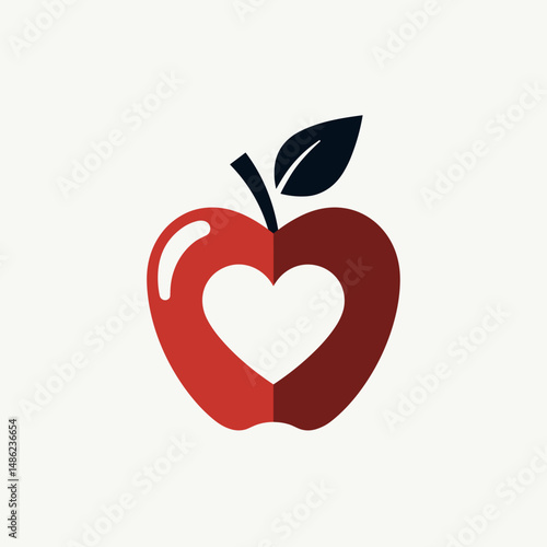 Red apple with heart shape design and green leaf on white background  