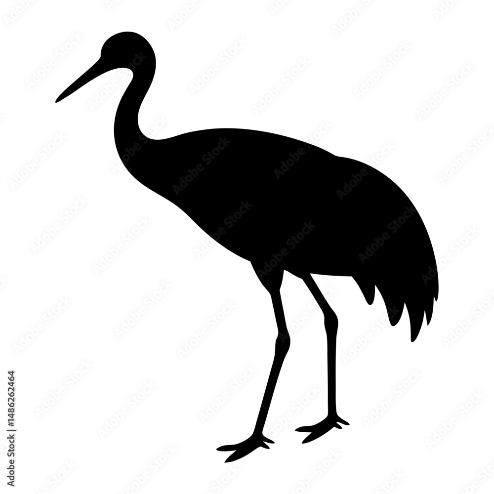 Fototapeta premium Silhouette of a majestic crane standing tall with elegance and grace
