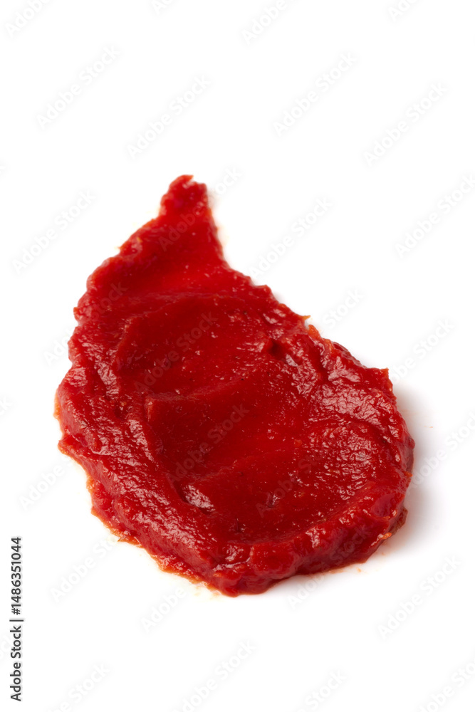 Obraz premium smear of red tomato ketchup isolated on white background