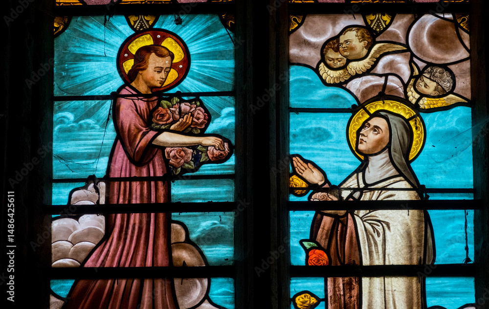 Obraz premium Stained glass (19th century) of St. Therese of Lisieux, Carmelite nun and Saint of the Roman Catholic Church.