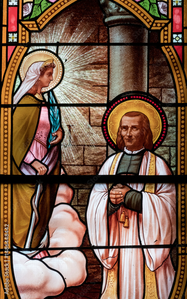 Obraz premium Stained glass (19th century) of St. John Mary Vianney the Holy priest of Ars.