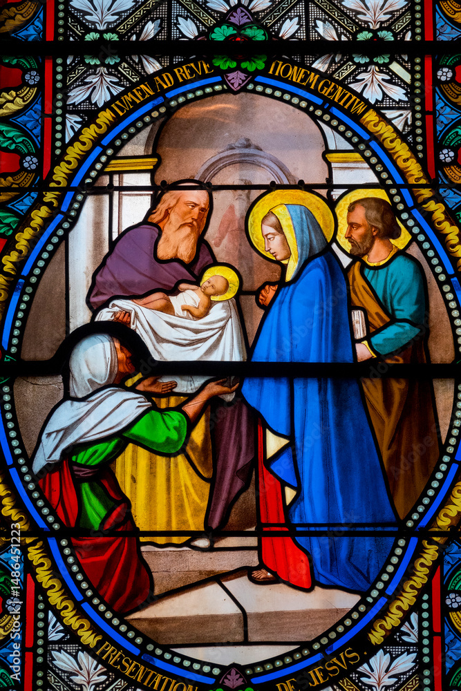Fototapeta premium Stained glass (19th century) of The childhood of Jesus: Presentation of Jesus at the Temple.