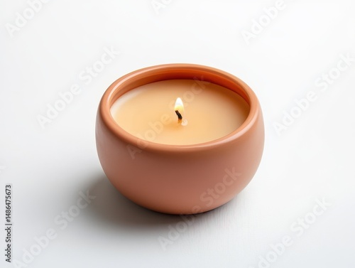 Wallpaper Mural Aromatic candle in ceramic pot with flame for relaxation, spa, and home decor use cases. Torontodigital.ca