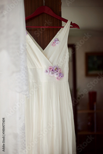 wedding dress on a hanger