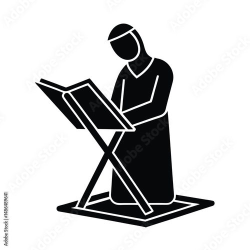 Muslim woman reading quran on prayer mat