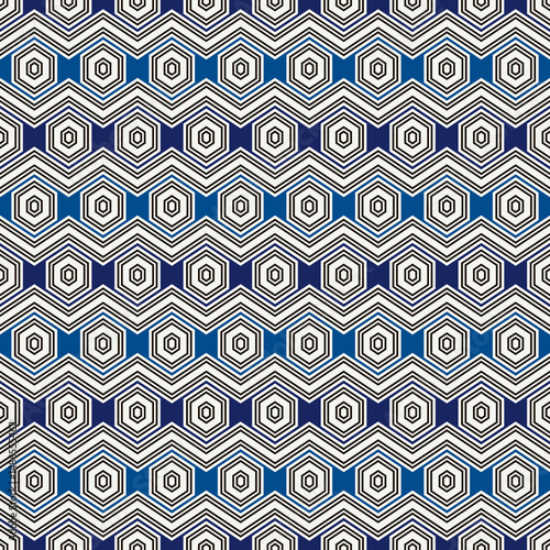 Zigzag seamless pattern. Hexagon mosaic tiles ornament. Ethnic surface print. Repeated geometric figures background. Ornamental wallpaper. Modern geo design digital paper. Vector abstract art