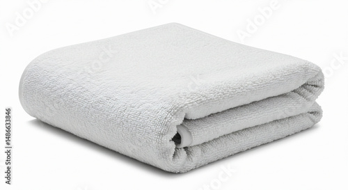 Folded white bath towel on white background.