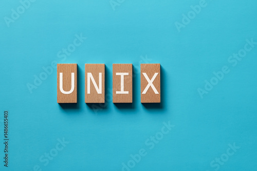 There is wood block with the word UNIX. It is as an eye-catching image.