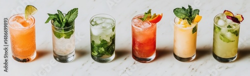 Wallpaper Mural Colorful cocktails in tall glasses, garnished with fresh mint and fruit slices Torontodigital.ca