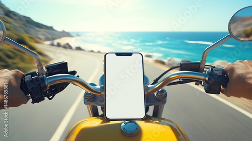 A plain white mock up smartphone screen in a phone holder placed in the middle of motorbike handle bars with the beach in the background