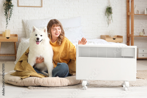 Young woman with cute dog w...