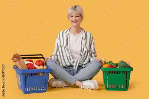 Smiling young woman sitting...